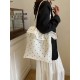 The new summer 2025 fresh and sweet single-shoulder bag with cute ruffles, a versatile Korean-style bag with large capacity for commuting to school