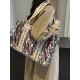 The 2025 new Gentle Woman large-capacity letter single-shoulder tote is a fashionable and versatile canvas bag for class commuting