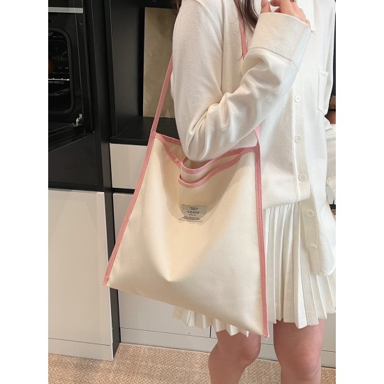The 2025 summer new Dopamine-colored large-capacity single-shoulder tote bag is a simple and versatile student commuting bag for class